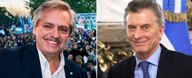 Alberto Fernández y Mauricio Macri, con sonrisas. La sociedad, con gesto adusto | Foto: Zonal Noticias.
